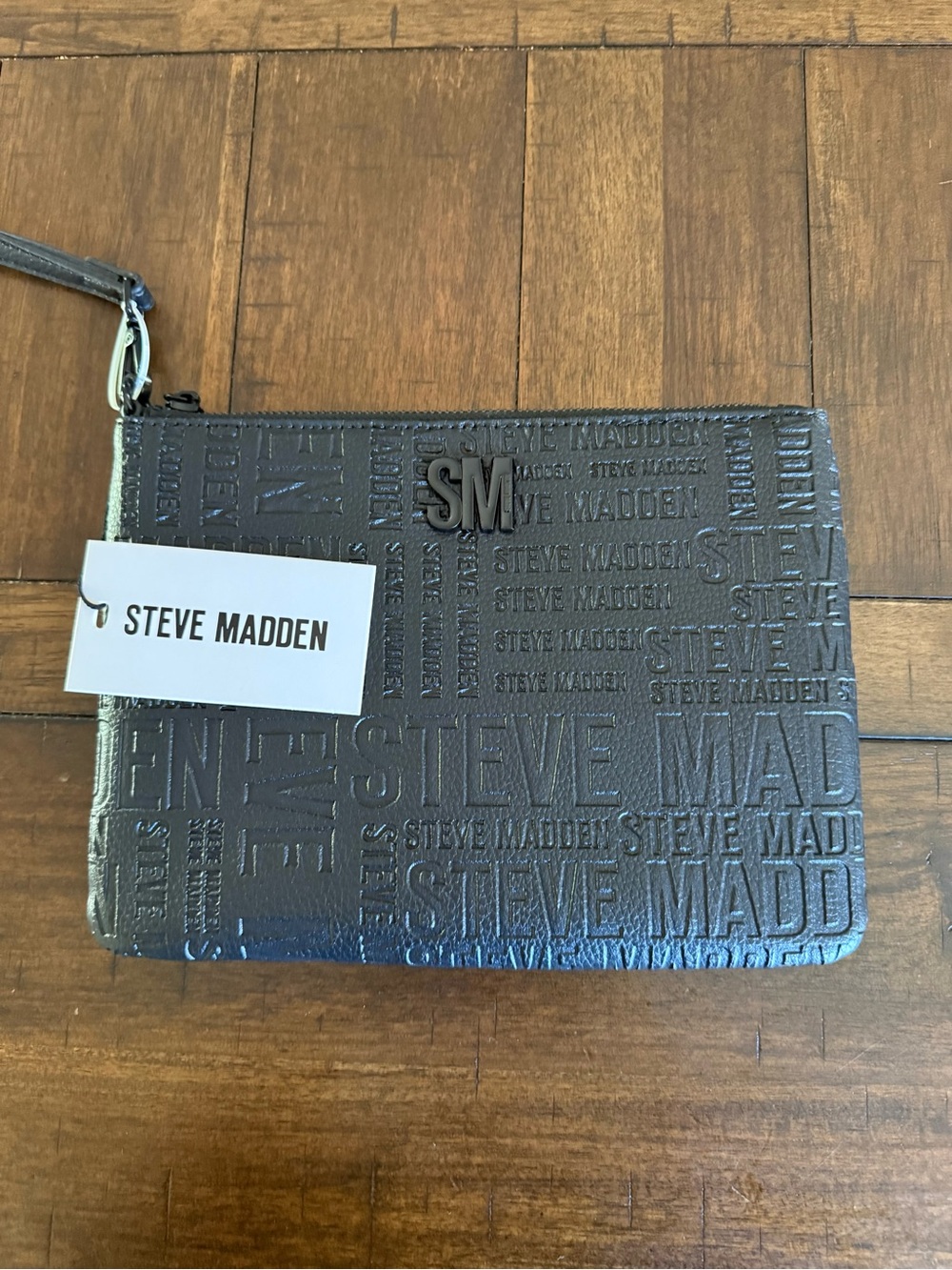 Steve Madden Black Embossed Logo Wristlet with SM Accent